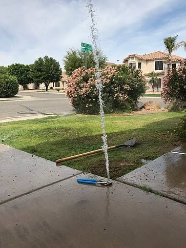 Water line leak on a home property.