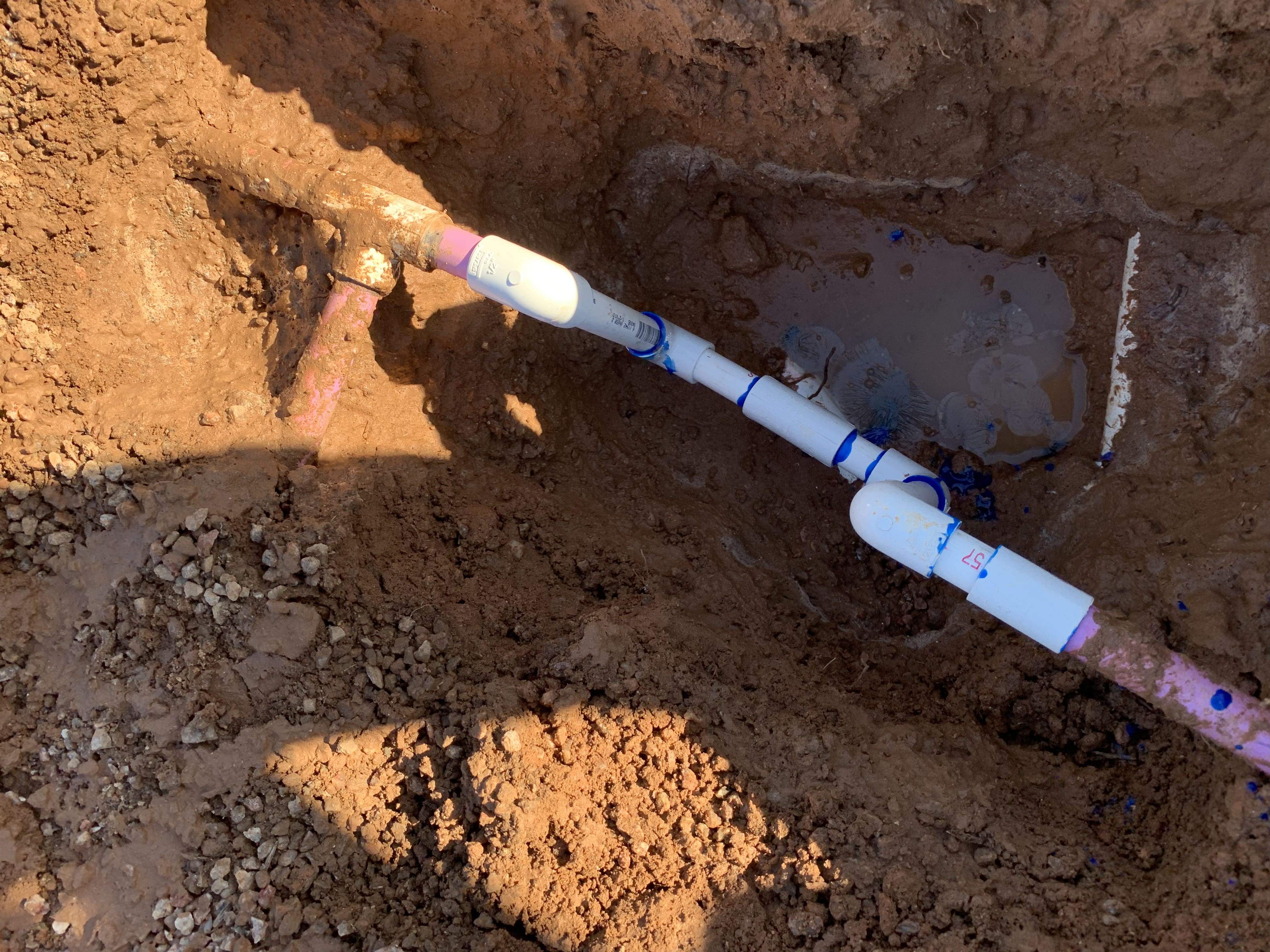 Mainline pipe system being repaired. Mainline pipe system being repaired.